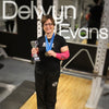 Delwyn Evans, powerlifter is a TXG brand ambassador who wears TXG sports compression arm sleeves for training