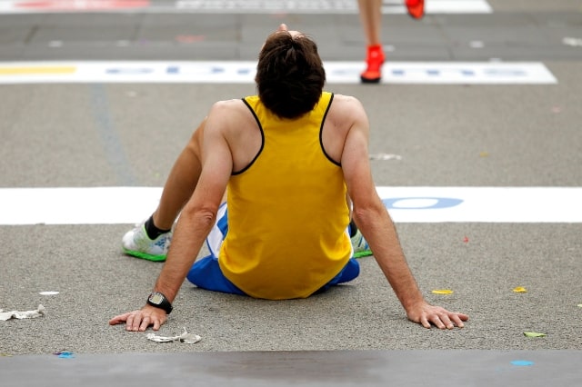 Runner resting after an event
