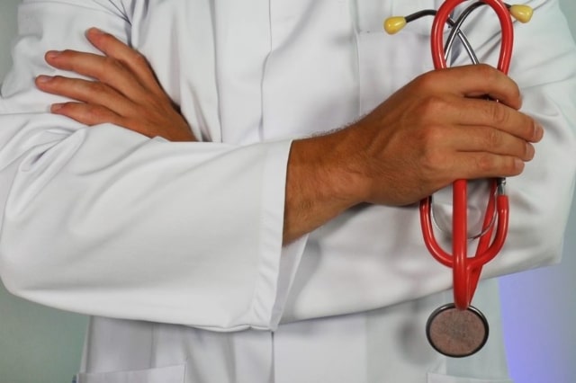 Medical Doctor holding a stethoscope