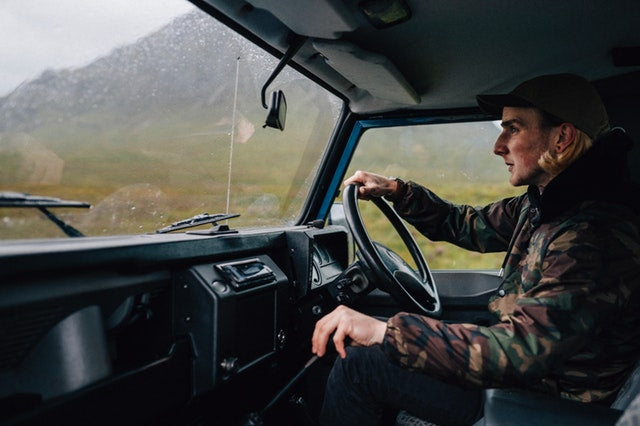 Truck driver in his truck driving