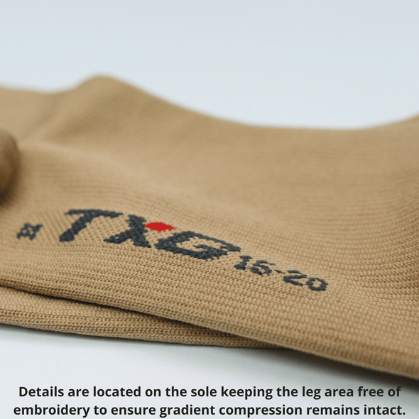 TXG Medical compression socks has the product details embroidered on the sole so that the gradient compression is not compromised