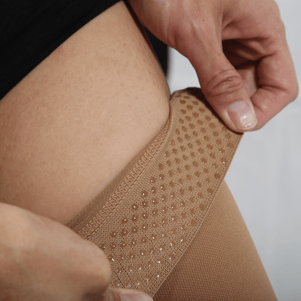 Inside cuff of TXG thigh high compression stockings