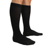 Male model wearing classic medical compression socks in black colour by TXG Australia