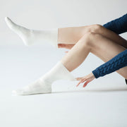 woman wearing txg cushioned diabetic socks