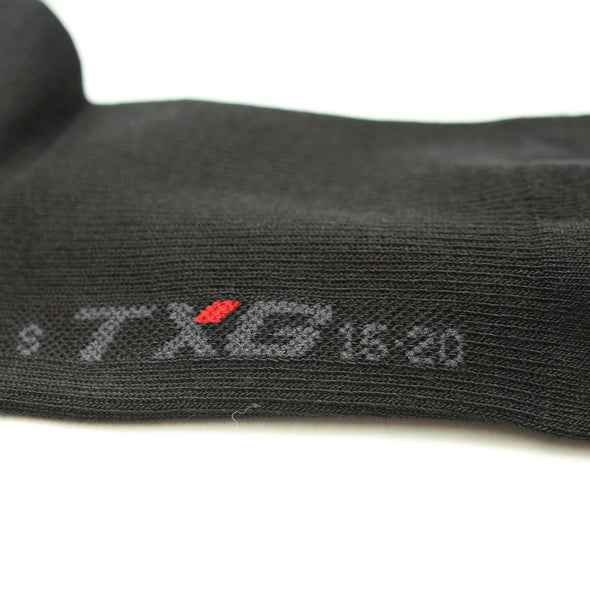 TXG medical compression socks for women has the product details embroidered on the sole of the sock so the gradient compression is not compromised